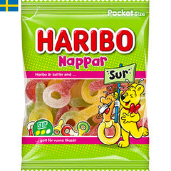 Haribo Sura Nappar - Gott för dig som gillar Haribos nappar och vill ha dem lite sura. Leverans till din dörr i Portugal och Spanien.